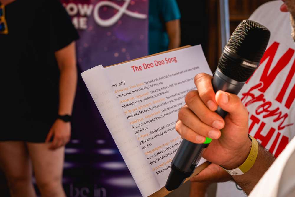 Private group enjoying karaoke party on boat in Greece - Corporate Cruises in Athens