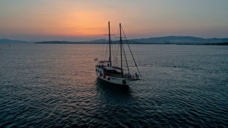 Group sunset cruise in Athenian reviera with 49 guests enjoying BBQ on board and greek menu