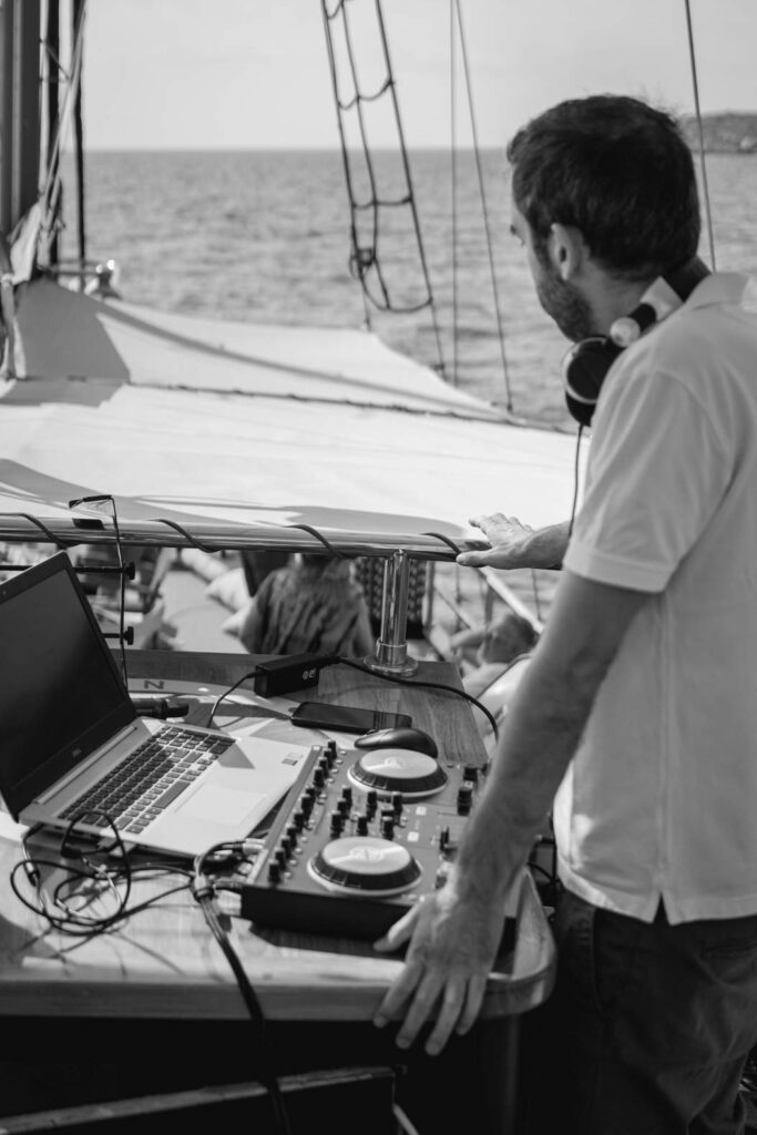 DJ playing music during corporate cruise in Athens
